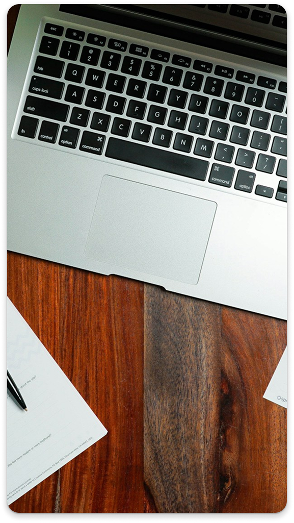 Laptop on desk representing volunteering work